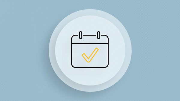 Symbolic image with a calendar marked with a tick.