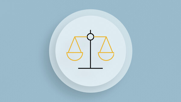 Symbolic image with scales representing justice.